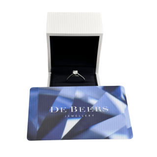 Solitaire de Beers, platinum and diamond.