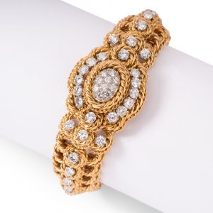 Montre mystérieuse Régner Paris en or jaune 18K et diamants