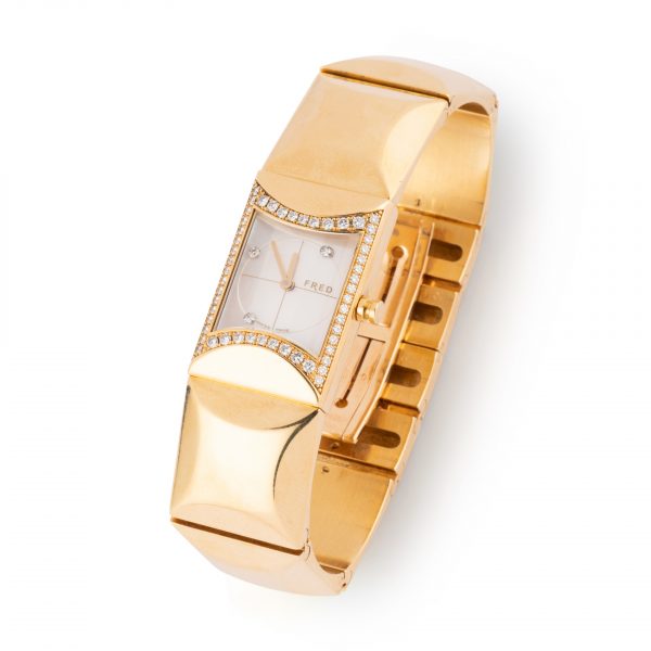 Montre Fred vintage en or jaune et diamants