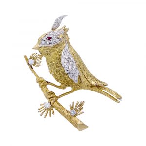 Broche Boucheron, “Oiseau sur sa branche”, or jaune, platine.