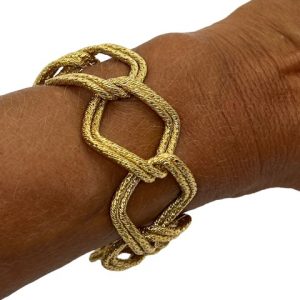 Un Bracelet George Lenfant, “Paillette” en or jaune